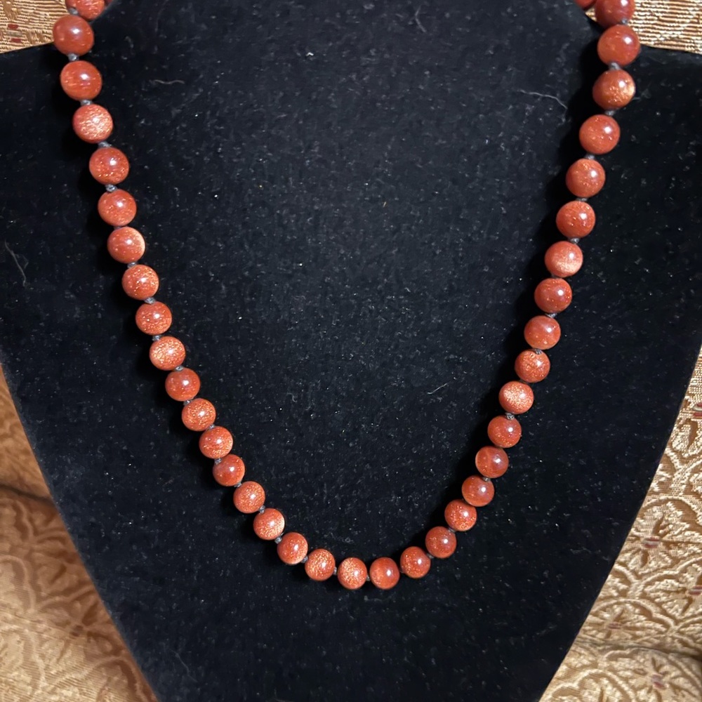 18” goldstone bead hand knotted necklace with 14k gold filled clasp